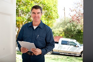 Man at Door with papers