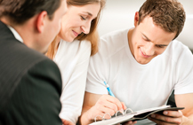 insurance agent with young couple